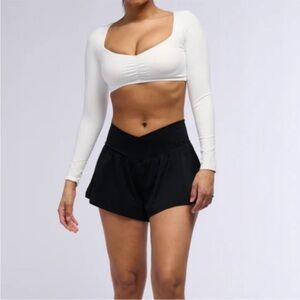 On the Move AKIRA Ruffle Short in Black lg